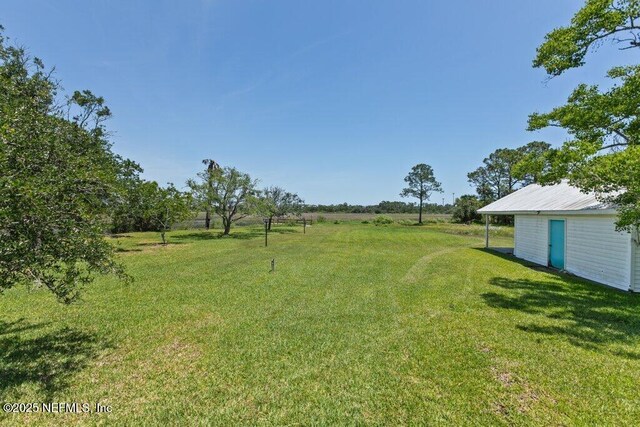 3060 Lewis Speedway, Saint Augustine, FL 32084 - view of green lawn featuring a rural view