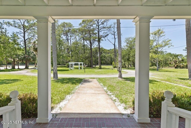 3060 Lewis Speedway, Saint Augustine, FL 32084 - view of green lawn featuring view of wooded area