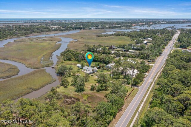 3060 Lewis Speedway, Saint Augustine, FL 32084 - aerial view of property's location with a nearby body of water and a tree filled landscape