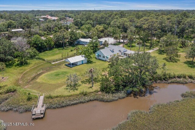 3060 Lewis Speedway, Saint Augustine, FL 32084 - aerial view of property and surrounding area with a nearby body of water and a forest