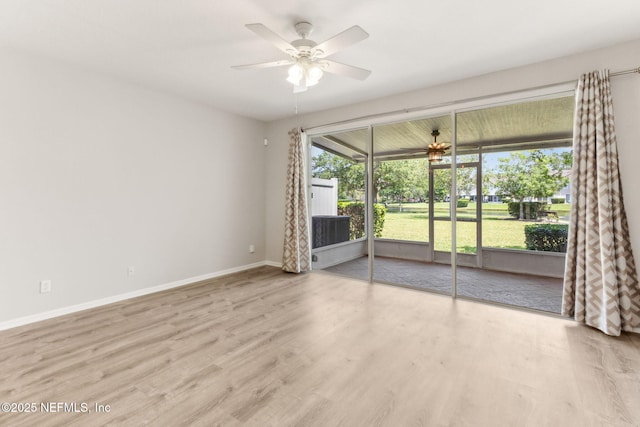 7990 Baymeadows Rd Unit 2404, Jacksonville, FL 32256 - spare room featuring ceiling fan, wood finished floors, and baseboards