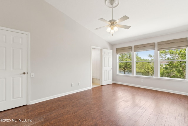 7990 Baymeadows Rd Unit 2404, Jacksonville, FL 32256 - unfurnished bedroom with lofted ceiling, baseboards, dark wood finished floors, and ceiling fan