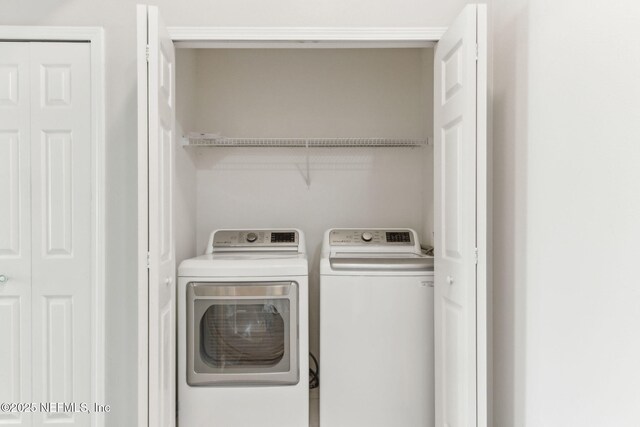 7990 Baymeadows Rd Unit 2404, Jacksonville, FL 32256 - laundry area featuring washer and dryer