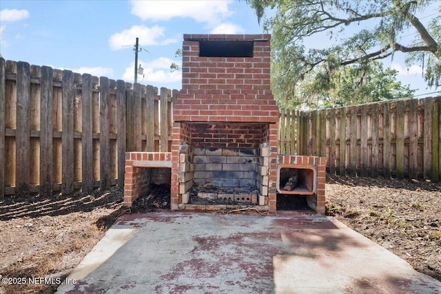 2767 Laten Ln, Jacksonville, FL 32216 - view of patio / terrace featuring an outdoor brick fireplace