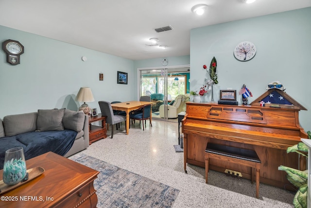 723 Montego Rd W, Jacksonville, FL 32216 - living area with speckled floor