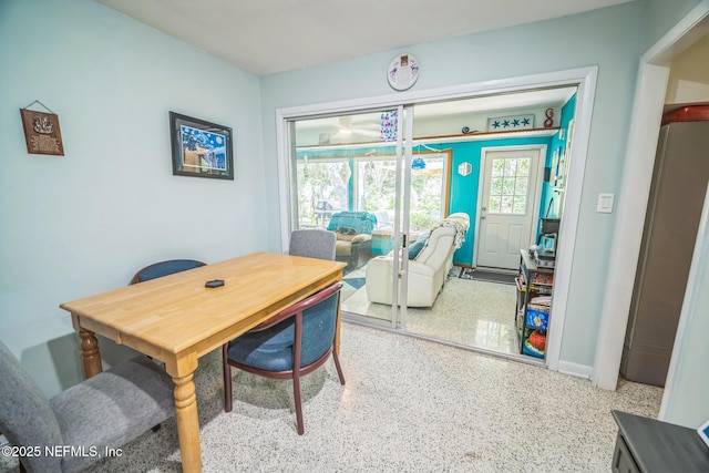 723 Montego Rd W, Jacksonville, FL 32216 - dining room featuring speckled floor and baseboards