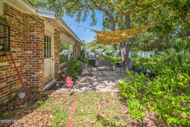 723 Montego Rd W, Jacksonville, FL 32216 - fenced backyard featuring a patio area