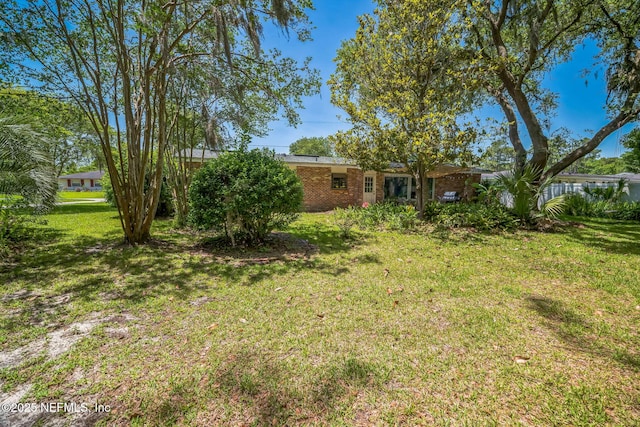723 Montego Rd W, Jacksonville, FL 32216 - view of green lawn