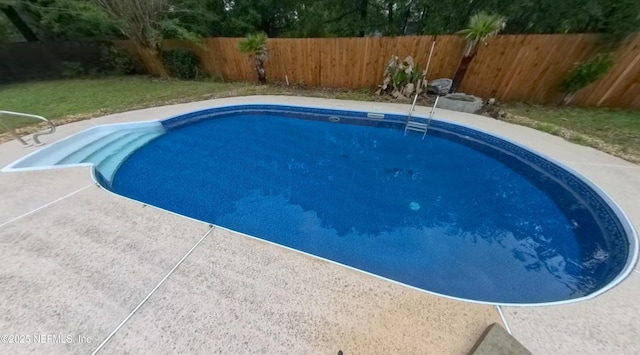 4833 Saddlehorn Trl, Middleburg, FL 32068 - view of swimming pool featuring a fenced backyard