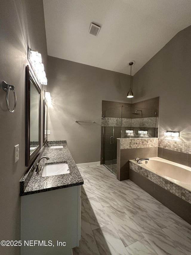 1456 Greenway Pl, Fleming Island, FL 32003 - bathroom featuring a garden tub, a shower stall, marble look tile flooring, double vanity, and lofted ceiling