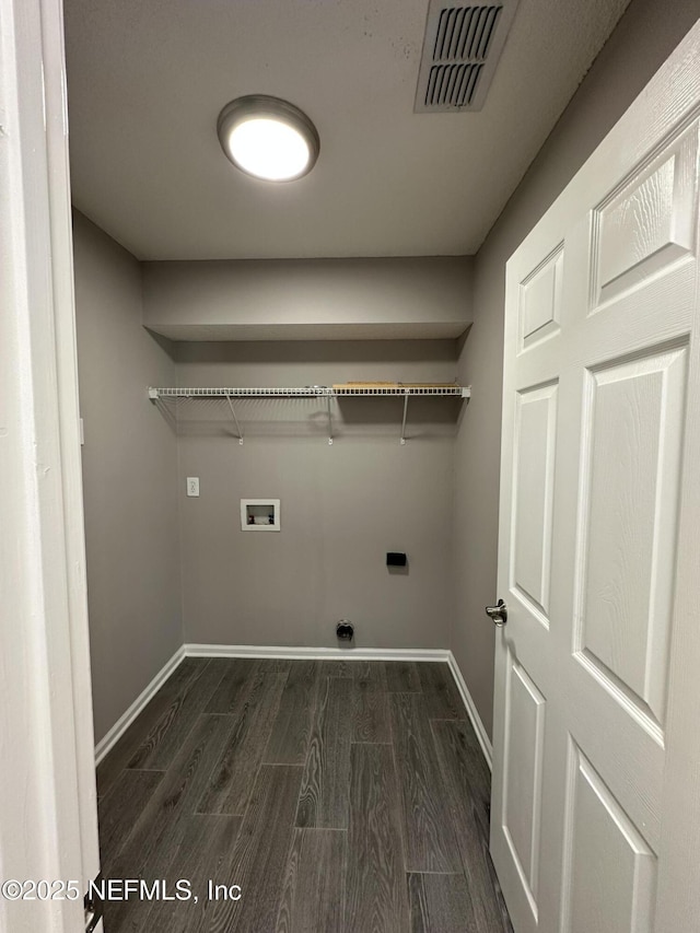 1456 Greenway Pl, Fleming Island, FL 32003 - laundry room with washer hookup, hookup for an electric dryer, baseboards, and dark wood finished floors