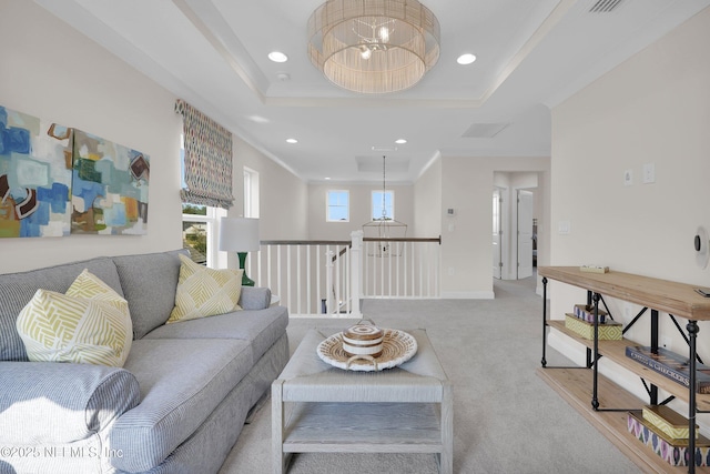 44 Sea Grn Way, Ponte Vedra, FL 32081 - living room featuring carpet floors, recessed lighting, a chandelier, a tray ceiling, and baseboards