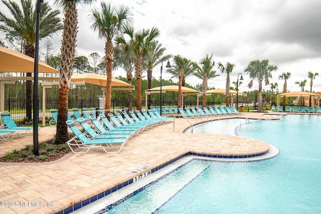 44 Sea Grn Way, Ponte Vedra, FL 32081 - community pool with a patio and fence