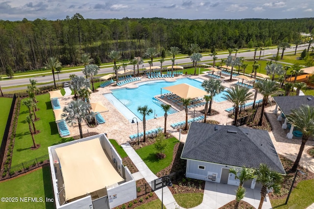 44 Sea Grn Way, Ponte Vedra, FL 32081 - bird's eye view of a pool area and a forest