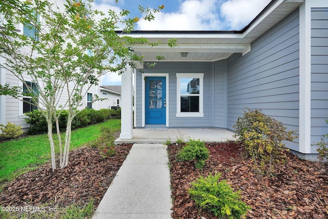 328 Clarys Run, Saint Augustine, FL 32092 - doorway to property featuring a porch