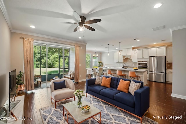 194 Magnolia Creek Walk, Ponte Vedra, FL 32081 - living room with crown molding, a ceiling fan, dark wood-type flooring, baseboards, and recessed lighting