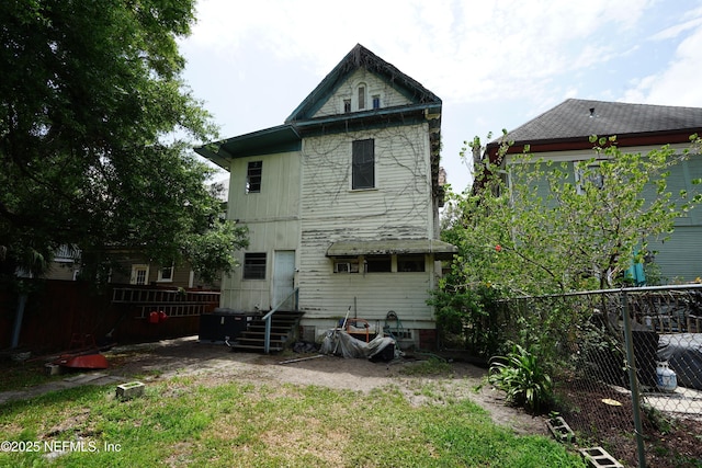 223 E 6th St, Jacksonville, FL 32206 - rear view of property with entry steps and fence