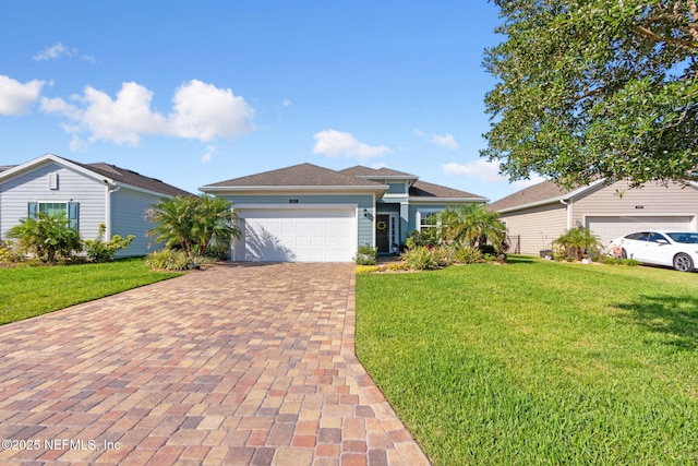 267 Ash Breeze Cv, Saint Augustine, FL 32095 - ranch-style home featuring decorative driveway, an attached garage, and a front lawn