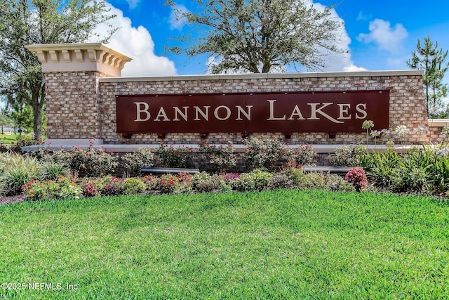 267 Ash Breeze Cv, Saint Augustine, FL 32095 - community / neighborhood sign with a yard