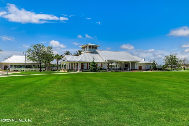 267 Ash Breeze Cv, Saint Augustine, FL 32095 - view of front of house featuring a front lawn and metal roof