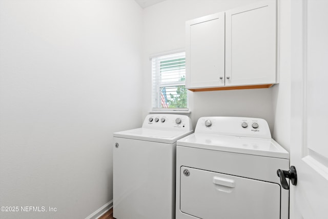 32 Mosaic Park Ave, Saint Augustine, FL 32092 - laundry room featuring washing machine and dryer and cabinet space