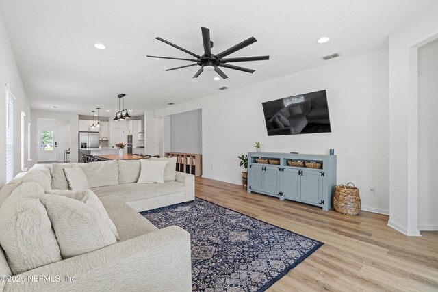 32 Mosaic Park Ave, Saint Augustine, FL 32092 - living room with light wood-style floors, a ceiling fan, recessed lighting, and baseboards