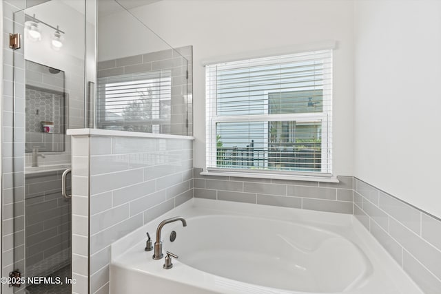 32 Mosaic Park Ave, Saint Augustine, FL 32092 - bathroom featuring a garden tub and a shower stall