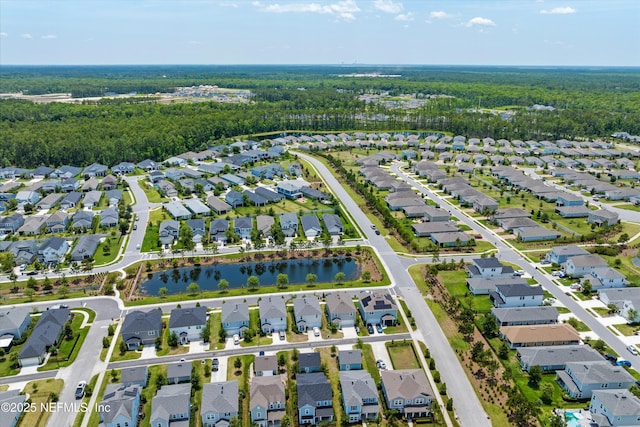 32 Mosaic Park Ave, Saint Augustine, FL 32092 - aerial overview of property's location featuring nearby suburban area and a nearby body of water