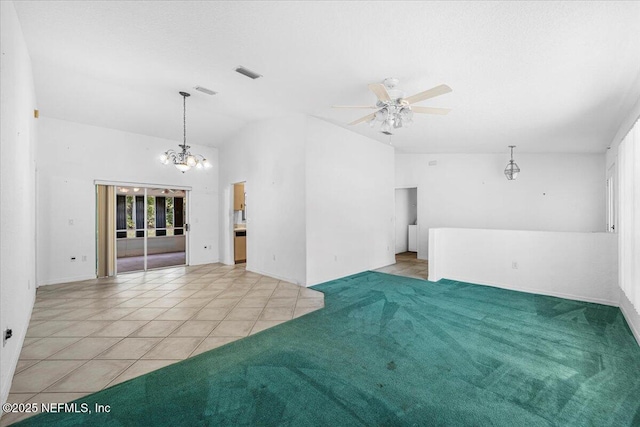 30 Patuxent Ln, Palm Coast, FL 32164 - unfurnished living room featuring ceiling fan, a chandelier, light tile patterned floors, lofted ceiling, and light carpet