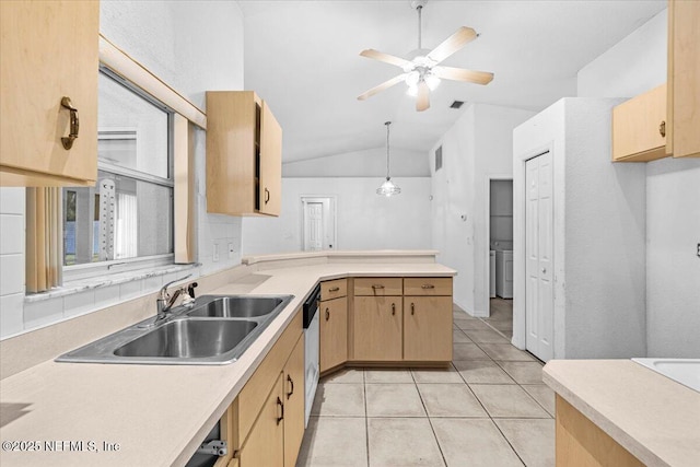 30 Patuxent Ln, Palm Coast, FL 32164 - kitchen with light brown cabinets, light countertops, a peninsula, and vaulted ceiling