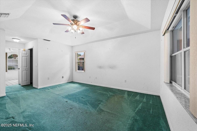 30 Patuxent Ln, Palm Coast, FL 32164 - carpeted empty room featuring ceiling fan, baseboards, and a textured ceiling