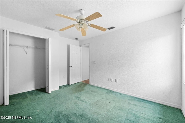 30 Patuxent Ln, Palm Coast, FL 32164 - unfurnished bedroom with carpet floors, a closet, ceiling fan, and baseboards