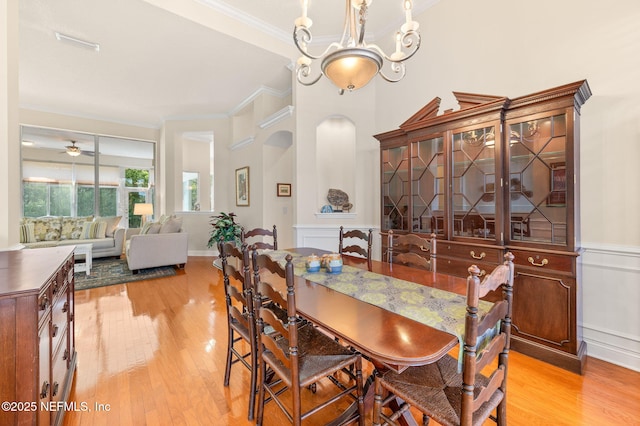1460 Atlantic Breeze Way, Ponte Vedra Beach, FL 32082 - dining room with ornamental molding, light wood finished floors, a chandelier, and ceiling fan