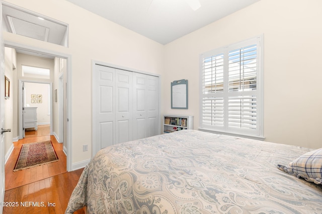 1460 Atlantic Breeze Way, Ponte Vedra Beach, FL 32082 - bedroom featuring wood-type flooring, a closet, and baseboards