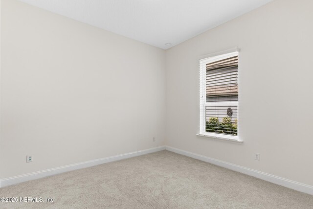 1098 Spanish Bay Ct, Orange Park, FL 32065 - unfurnished room featuring light colored carpet and baseboards