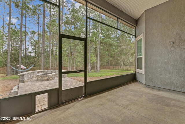 1098 Spanish Bay Ct, Orange Park, FL 32065 - unfurnished sunroom with an outdoor fire pit