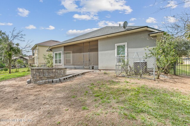 1098 Spanish Bay Ct, Orange Park, FL 32065 - rear view of house featuring a sunroom