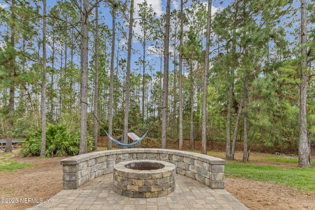 1098 Spanish Bay Ct, Orange Park, FL 32065 - view of patio with an outdoor fire pit