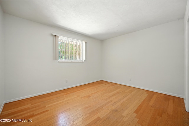 7704 Clover Ln, Keystone Heights, FL 32656 - empty room featuring light wood-type flooring and baseboards
