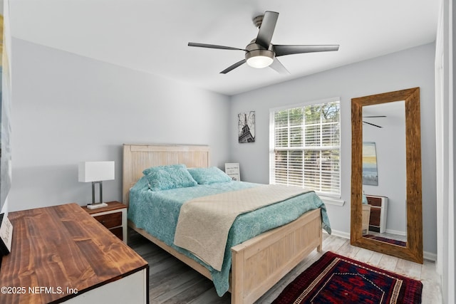 12489 Windy Willows Dr N, Jacksonville, FL 32225 - bedroom featuring light wood-type flooring, ceiling fan, and baseboards