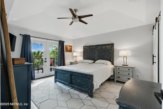 12489 Windy Willows Dr N, Jacksonville, FL 32225 - bedroom with access to exterior, french doors, lofted ceiling, a barn door, and ceiling fan