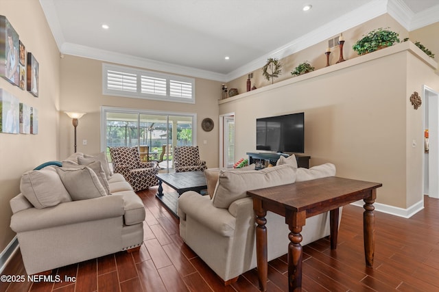 595 Glasgow Ct, Orange Park, FL 32073 - living room featuring ornamental molding, dark wood-style flooring, baseboards, and recessed lighting