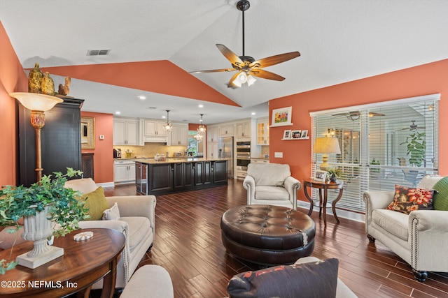 595 Glasgow Ct, Orange Park, FL 32073 - living room featuring a ceiling fan, lofted ceiling, dark wood-style flooring, and recessed lighting