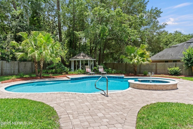 595 Glasgow Ct, Orange Park, FL 32073 - view of pool with a gazebo, a patio area, a fenced backyard, and a pool with connected hot tub