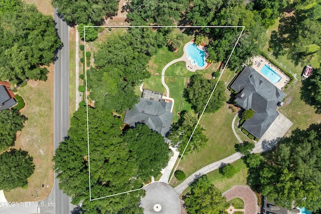 595 Glasgow Ct, Orange Park, FL 32073 - aerial overview of property's location featuring a pool and property parcel outlined