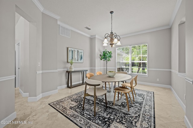 13759 Wingfield Pl, Jacksonville, FL 32224 - dining space with a chandelier, ornamental molding, a textured ceiling, and baseboards