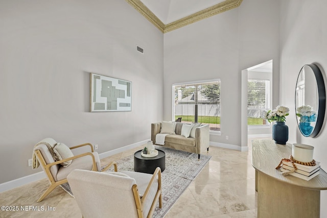 13759 Wingfield Pl, Jacksonville, FL 32224 - living room with a towering ceiling, baseboards, and crown molding