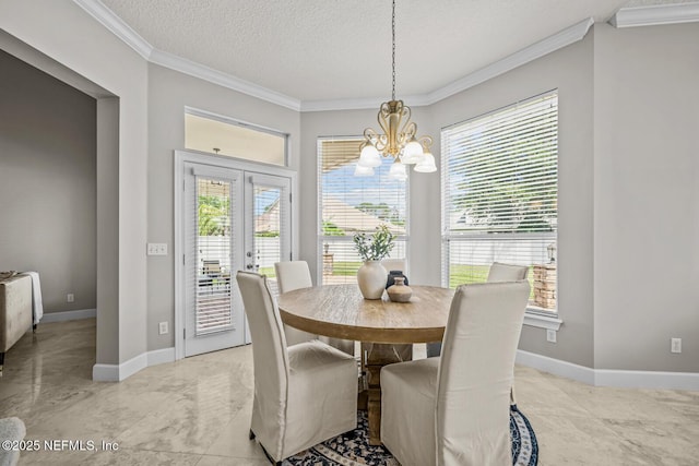 13759 Wingfield Pl, Jacksonville, FL 32224 - dining space with ornamental molding, a chandelier, plenty of natural light, a textured ceiling, and baseboards
