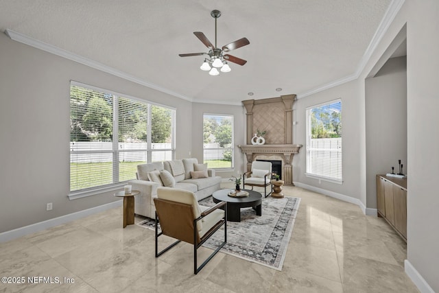13759 Wingfield Pl, Jacksonville, FL 32224 - living room featuring healthy amount of natural light, ceiling fan, baseboards, ornamental molding, and a large fireplace