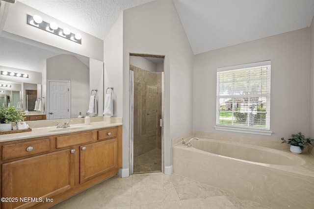 13759 Wingfield Pl, Jacksonville, FL 32224 - full bathroom with vanity, a bath, vaulted ceiling, and a shower stall